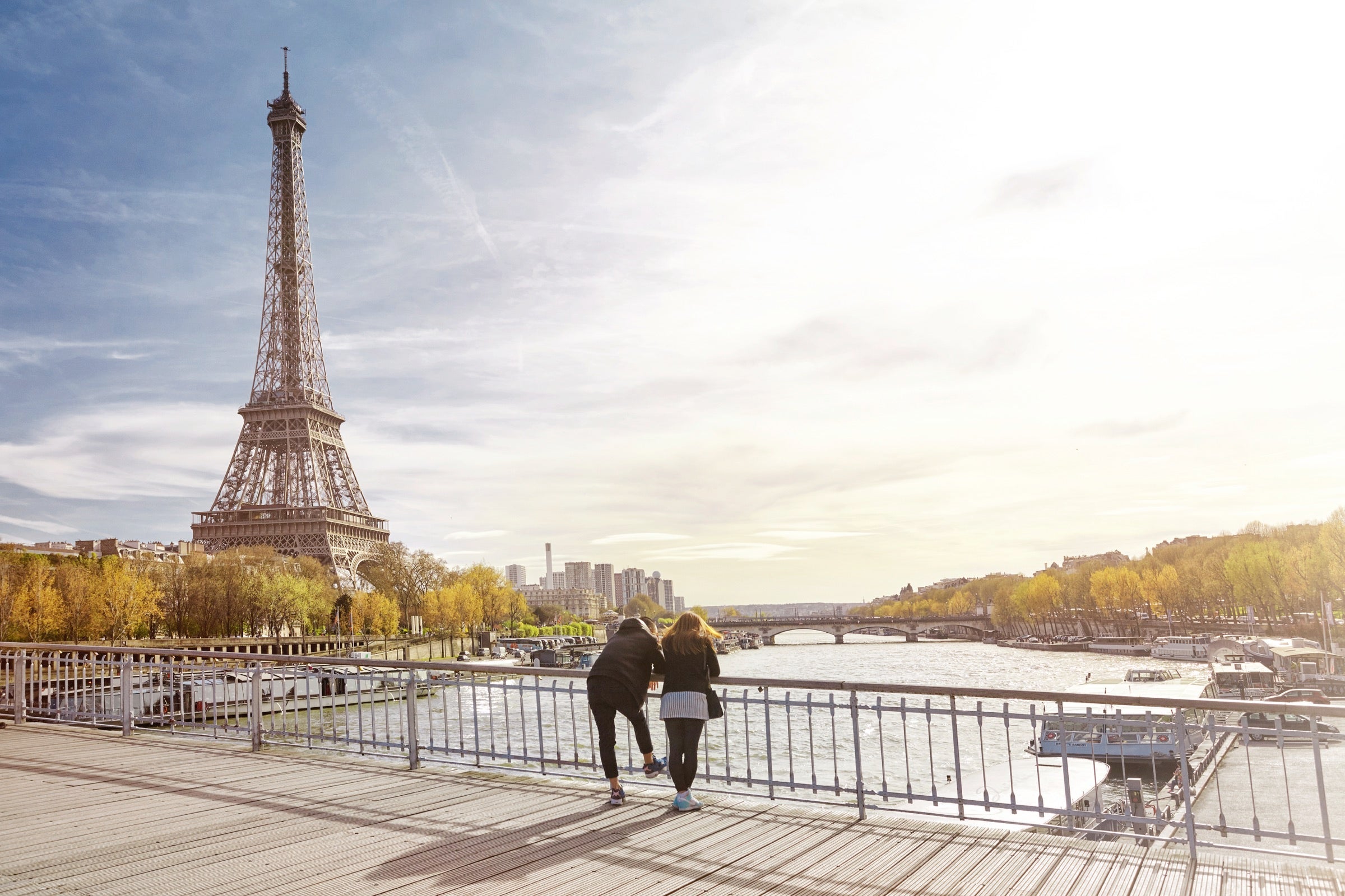 Tourists looking at the Eiffel Tower in Paris
